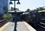 "Train of Many Colors" approaching Sheepshead Bay Station heading north